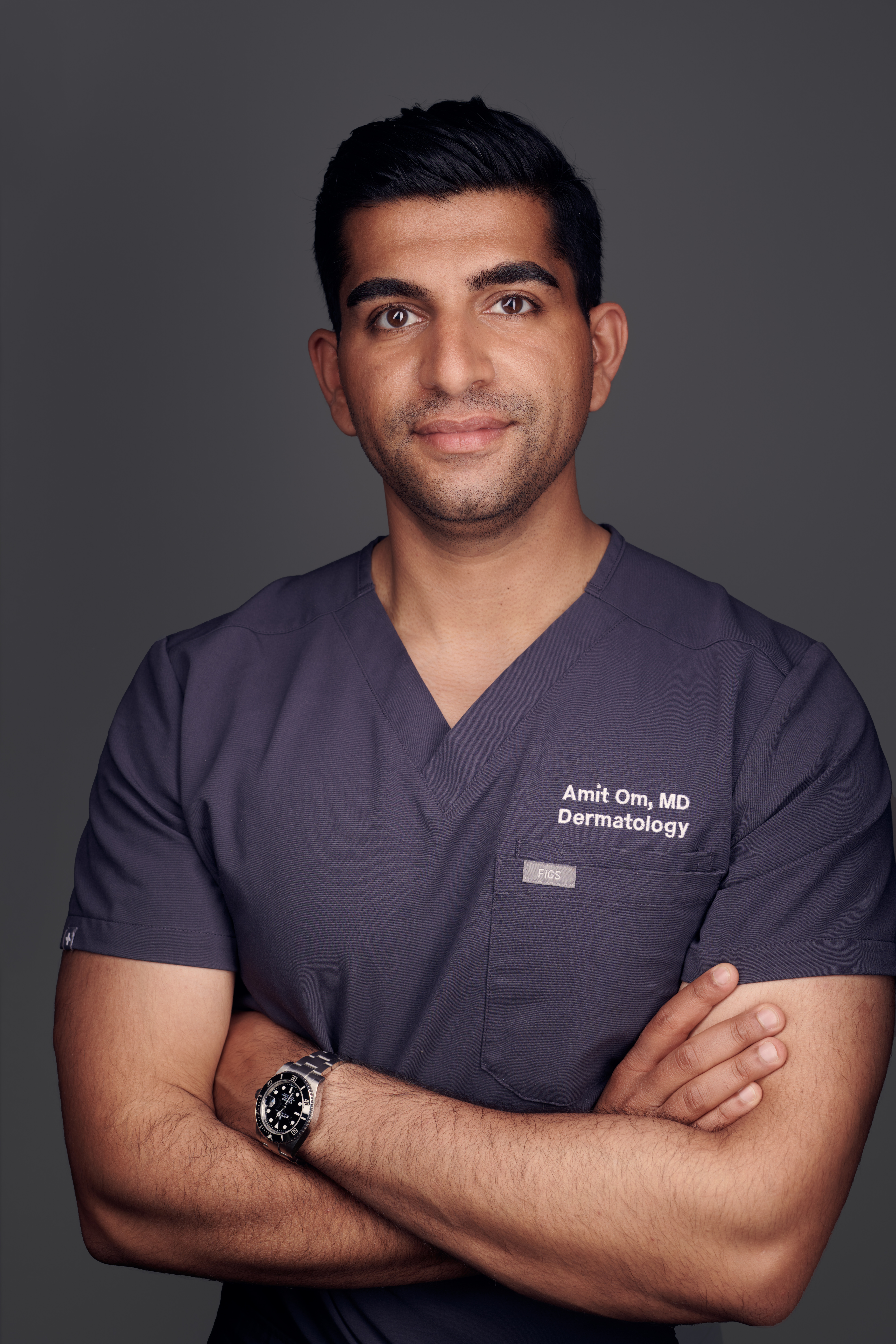 Dr. Amit Om, board-certified dermatologist and founder of Venom